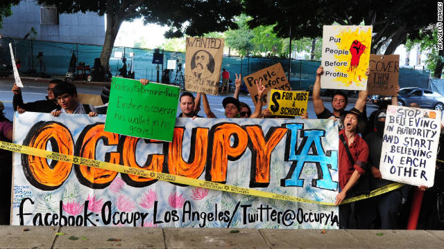 http://i2.cdn.turner.com/cnn/dam/assets/111005033218-occupy-wall-street-los-angeles-story-top.jpg
